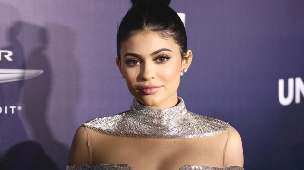 Kylie Jenner caused mayhem when she went along as the date of a teenager in Sacramento, California.