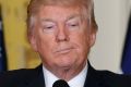 President Donald Trump listens during a news conference with NATO Secretary General Jens Stoltenberg.