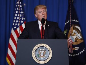 President Donald Trump speaks at Mar-a-Lago in Palm Beach, Fla., Thursday, April 6, 2017, after the U.S. fired a barrage of cruise missiles into Syria Thursday night in retaliation for this week's gruesome chemical weapons attack against civilians.