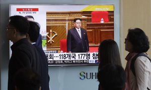 People pass by a TV screen showingNorth Korean leader Kim Jong Un during the 7th Congress of the Workers' Party of Korea on Friday, at the Seoul Railway Station in Seoul, South Korea, Saturday, May 7, 2016. North Korean leader Kim  hailed his country's recent nuclear test to uproarious applause as he convened the first full congress of its ruling party since 1980, an event intended to showcase the North's stability and unity in the face of tough international sanctions and deepening isolation. (AP Photo/Ahn Young-joon)