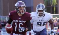 
Saint Francis Xavier University defensive lineman Kay Okafor (right) was bumped up four spots in latest rankings.
