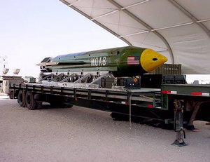 File - The GBU-43/B Massive Ordnance Air Blast bomb sits at an air base in Southwest Asia waiting to be used should it become necessary. The MOAB is also called