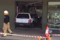 A car has crashed into a fish and chip shop on the Gold Coast, with the driver allegedly blowing over the blood-alcohol ...