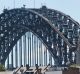 SHD. News. The Sydney Swans flag flies over the Harbour Bridge on the day of the AFL Grand Final, Sydney Swans vs ...