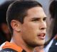 SYDNEY, AUSTRALIA - APRIL 02: Mitchell Moses of the Tigers (C) and team mates looks dejected after a Dragons try during ...