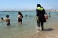 A woman wears a burkini at a beach in Marseille in southern France. 