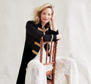 Carla Zampatti “Military Precision” coat, $1046. Spell & The Gypsy Collective “Evangeline” gown, $995. Zimmermann boots, ...