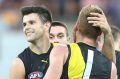 Trent Cotchin celebrates a goal against the Lions.