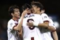 Away win: Dejan Damjanovic of FC Seoul is congratulated by Hwang Ki-Wook and Lee Seok-Hyun.