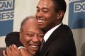 Sage advice: Tiger Woods hugs his father, Earl in 1997.