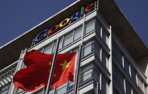 A Chinese flag flutters outside Google's China headquarters in Beijing, China, Wednesday, Jan. 13, 2010. Google Inc. will stop censoring its search results in China