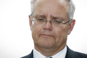 Treasurer Scott Morrison addresses the media during a doostop interview at Parliament House in Canberra on Friday 24 ...