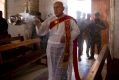 Christian militiamen stand guard during Easter mass in Qaraqosh, outside Mosul.