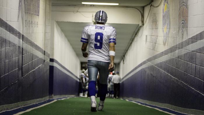 FILE - In this Dec. 20, 2008, file photo, Dallas Cowboys quarterback Tony Romo walks down the tunnel to the playing field at Texas Stadium before an NFL football game, in Irving, Texas. A person with knowledge of the decision says Romo is retiring rather than trying to chase a Super Bowl with another team after losing his starting job with the Cowboys. The all-time passing leader for the storied franchise is headed to the broadcast booth after considering those offers. The person spoke to The Associated Press on condition of anonymity Tuesday, April 4, 2017, because Romo's decision hasn't been announced. (AP Photo/File)