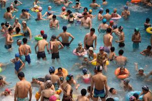 North Koreans spend their holiday weekend at the indoor swimming pool of Munsu water park on Sunday, April 16, 2017, in ...