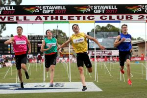 MELBOURNE, AUSTRALIA - APRIL 17: Matthew Rizzo (yellow) wins The Stawell Athletic Club Stawell Gift on April 17, 2017 in ...