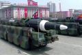 Missiles are paraded at Kim Il-sung Square in Pyongyang.