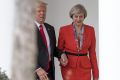 Theresa May has spoken out about that hand holding moment in American Vogue.