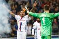 Boiling over: Security at French grounds has been of concern amid recent incidences of fans entering and throwing ...