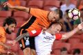 Up for it: Jade North of the Roar and Jack Clisby of the Wanderers compete for the ball the last time this Friday's ...