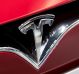 Tesla Inc. badge is displayed on the front grille of Model S 90D electric vehicle at the company's showroom in Hanam, ...