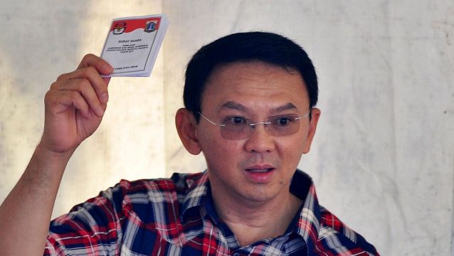 Jakarta Governor Ahok votes in the first round in February.
