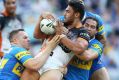 SYDNEY, AUSTRALIA - APRIL 17: David Nofoaluma of the Tigers is tackled during the round seven NRL match between the ...