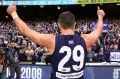Matthew Pavlich salutes the crowd in his farewell game.