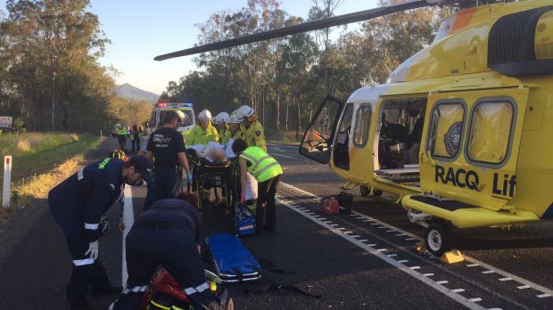 Patients are treated after a crash on the Bruce Highway south of Maryborough on Monday.