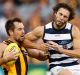 Geelong's James Parsons is in trouble for this bump on Luke Hodge.