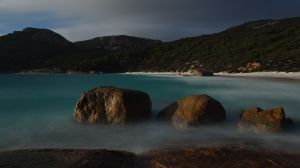 two-people-bay-rocks-by-sea_1200