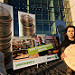 17 October, 2016 - 08:47 - A woman holds a giant loonie at the front of the Government of Canada Finance Building. Oxfam is asking Canadians to advocate for a budget that supports women everywhere to have access to decent and fairly paid work.
Tell our government to make a budget where work is paid, equal and valued for women. 