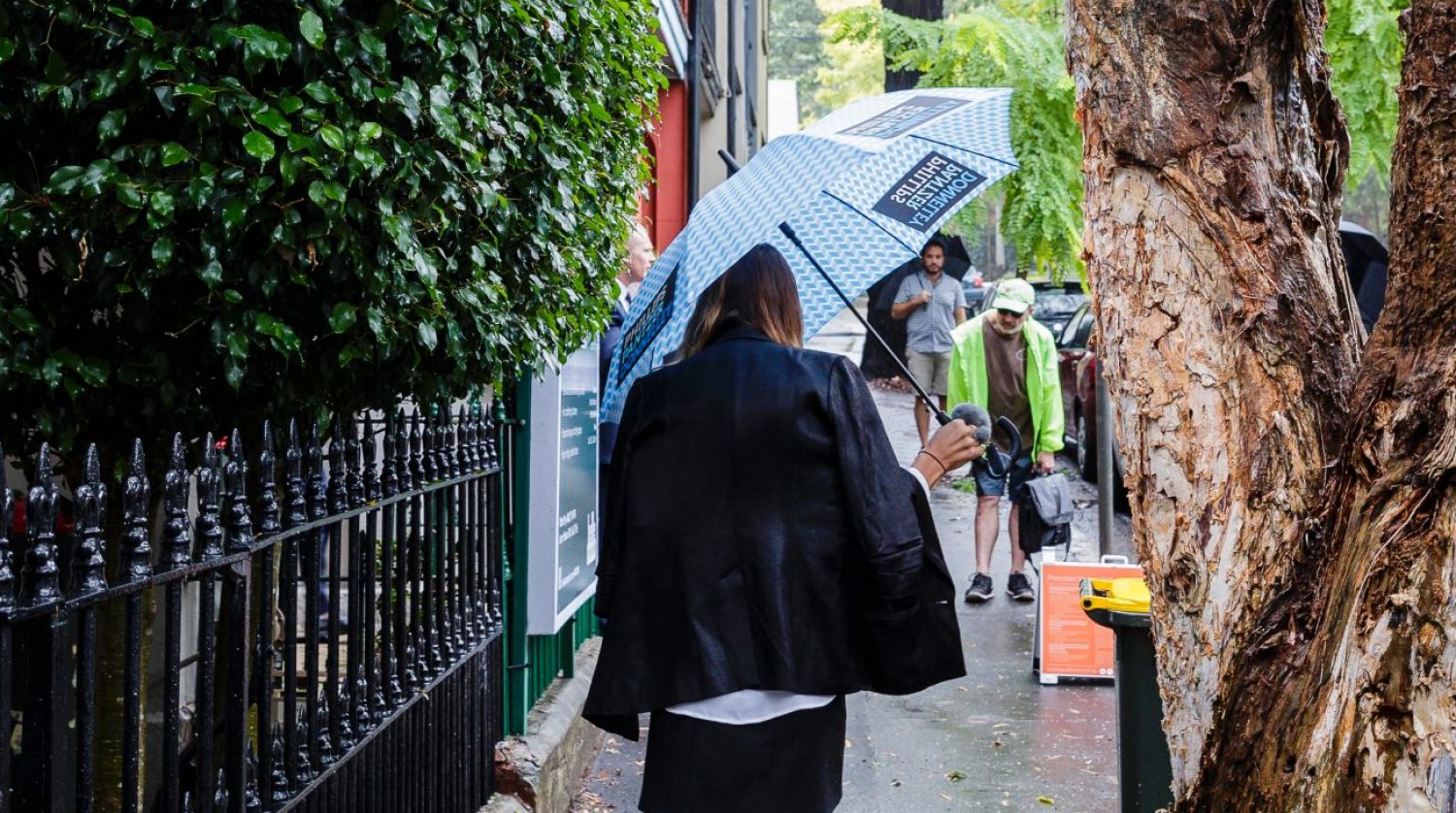 It may be a sellers market in Sydney but that didn't stop buyers from braving the rain at a Surry Hills auction last weekend.