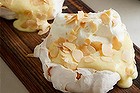 Rose meringues with apple curd and toasted almond.