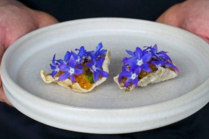 Trout nut butter, borage flowers and salmon roe, from the autumn 2016 menu at Brae, Birregurra. For The Age Good Food ...