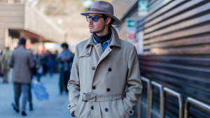 A trench coat can be an stylish winter layer, but avoid overdoing the mobster look.