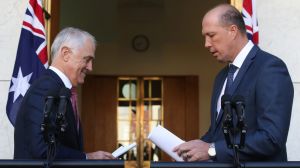 Preparing notes: Prime Minister Malcolm Turnbull and Immigration minister Peter Dutton on Thursday.