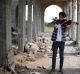 Ameen Mukdad, a violinist from Mosul who lived under IS rule for two and a half years, performs at Nabi Yunus shrine in ...