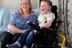 James Swan, 4, with mum Nicola. He is losing the ability to walk and eat normally, due to a mystery illness.