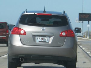 A Nissan Rouge vehicle drives by Interstate 270 in St. Louis, Missouri, USA on March 16, 2012.