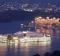 Udaipur's Lake Pichola and Taj Lake Palace Hotel at twilight.
