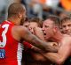 Flashpoint: Steve Johnson and Lance Franklin clash at the quarter time break during the 2016 AFL First Qualifying Final ...