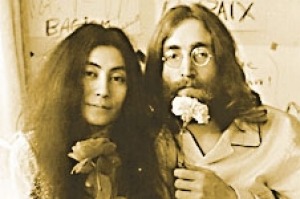 John Lennon and Yoko  'giving peace a chance" in their bed-in.