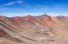 This picture is of the trail over the multi-coloured mountain, a section of the Camino del Apu, a multi day trek in the ...