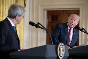 President Donald Trump, accompanied by Italian Prime Minister Paolo Gentiloni speaks during a joint news conference in the East Room of the White House in Washington, Thursday, April 20, 2017.