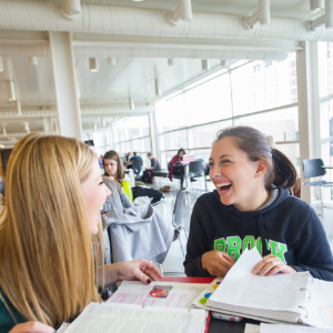 Second year speech and language studies students Christine Civiero and Harley Hamlin study in the plaza building on campus at Brock University. (Photograph by Cole Garside)