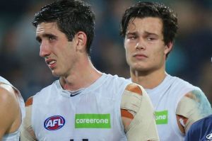 The Blues are dejected after their big loss t Port Adelaide.