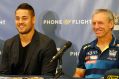 Happier days: Jarryd Hayne with Gold Coast coach Neil Henry after he signed with the Titans last season.