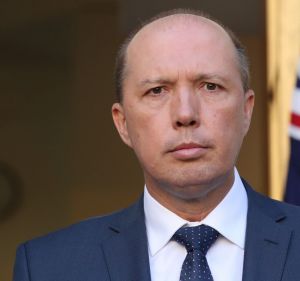 Immigration Minister Peter Dutton said the soldiers may have been motivated by concerns for the safety of a local child.