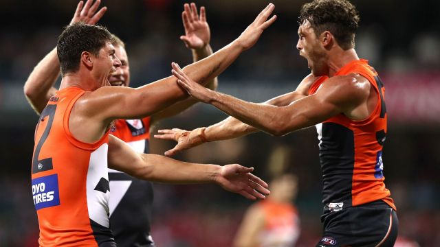 That winning feeling: Sam Reid and Jonathon Patton of the Giants celebrate a goal.